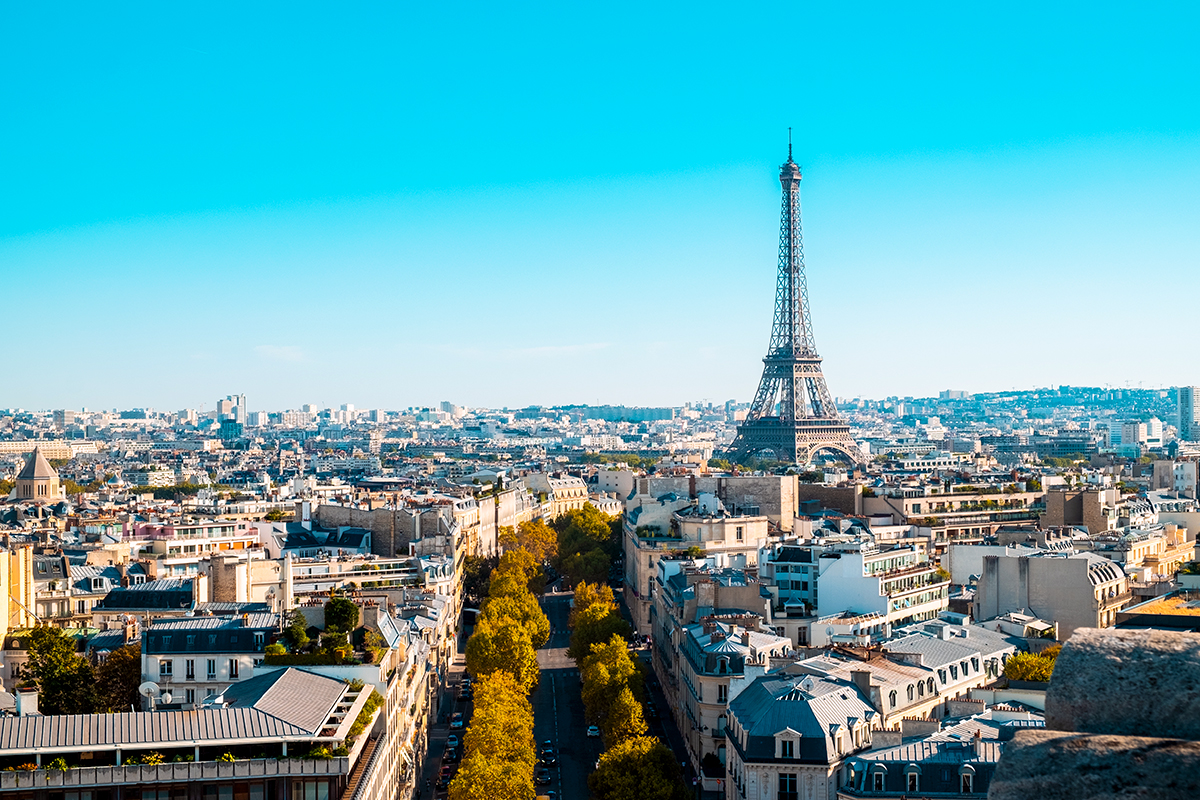 Cityscape of Paris under the sunlight and a blue sky in Fra